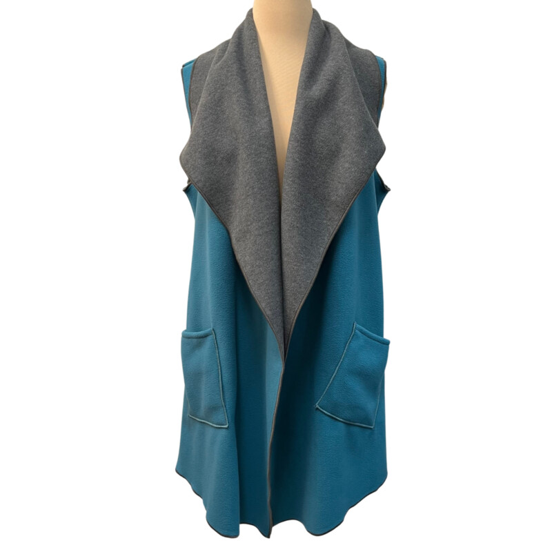 NWOT Mia Reis Fleece Vest
Reversible
Colors: Turquoise and Gray
Size: Small
Retails for $158.99