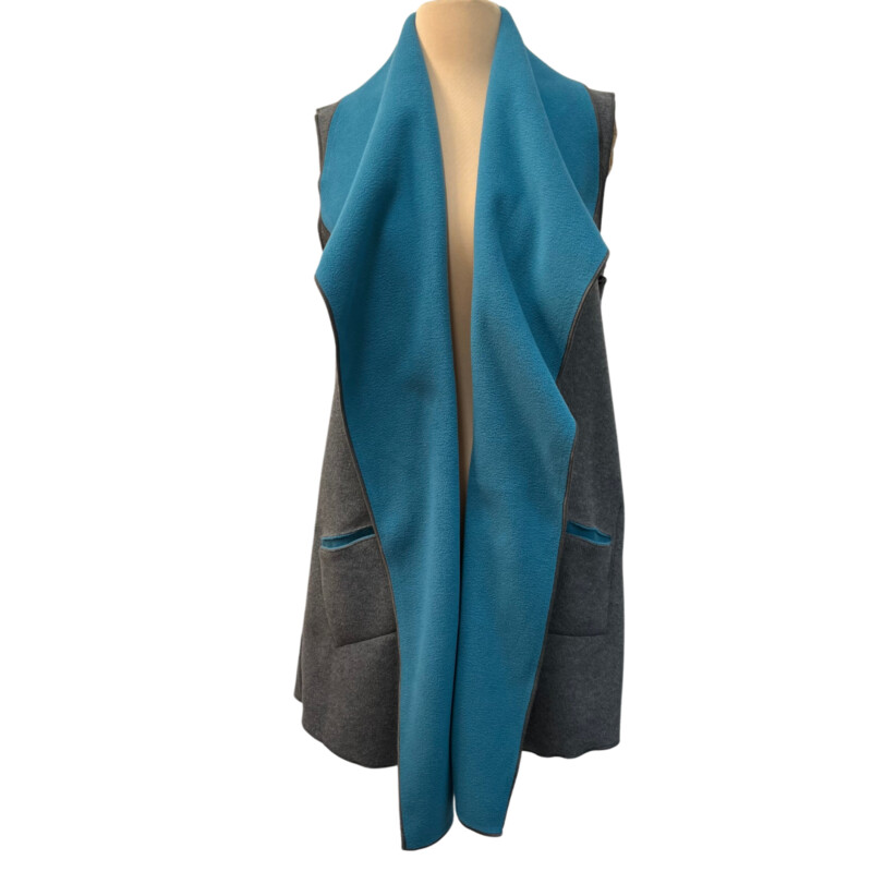 NWOT Mia Reis Fleece Vest
Reversible
Colors: Turquoise and Gray
Size: Small
Retails for $158.99