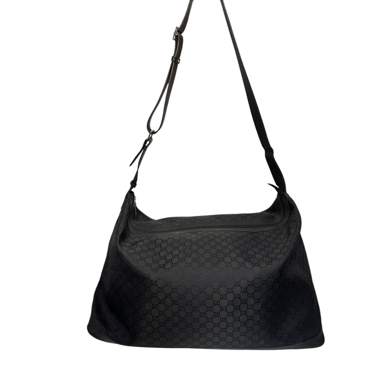 GUCCI Nylon Monogram Travel Duffel Bag in Black.<br />
Dimensions:<br />
Length: 24.00 in<br />
Width: 11.25 in<br />
Height: 15.00 in<br />
Style Code :105669 21337<br />
In Good Condition<br />
Does not come with original box or dust bag