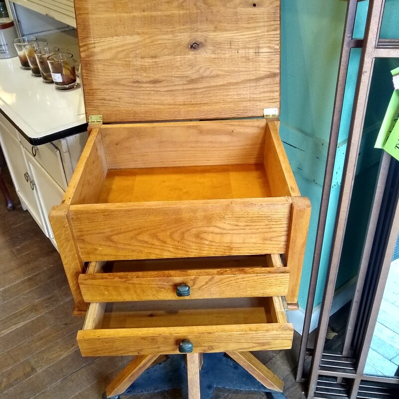 HM Storage Table/Wheels<br />
<br />
Unique handmade table with lift top storage and 2 drawers.  Table has a nice slate star connecting the legs and it is on wheels so very portable.<br />
<br />
Size: 21 in wide X 17 in deep X 37 in high