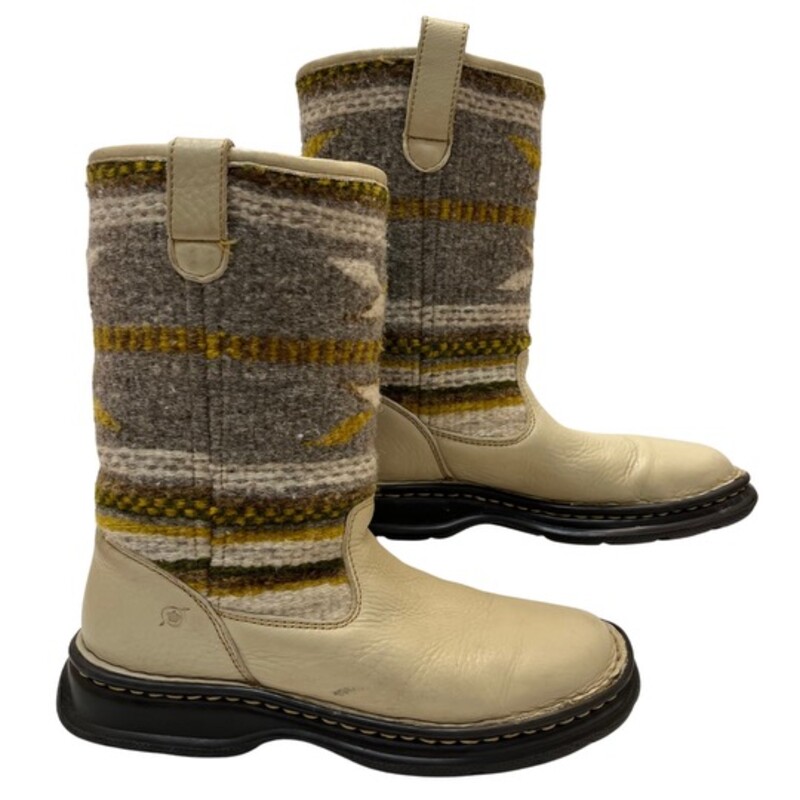 Born Tomahawk Boots<br />
Vintage 2000s<br />
Super cozy and unique style- perfect for winter<br />
Cream genuine leather foot with wool tribal print shaft<br />
Colors: Cream, Gray, Mustard, Brown, and Green<br />
Size: 9