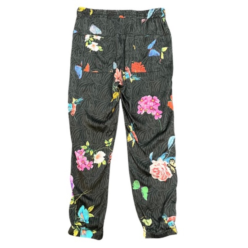 Johnny Was Blooming Elsie Jogger Pants<br />
<br />
The Blooming Elsie Jogger mixes style and comfort with its floral print and relaxed fit. The elegant stretch charmeuse fabric creates a draped look that works well with your favorite plain V-neck tee or with a simple silk tank top.<br />
Soft Silk Blend<br />
Elastic comfort waist<br />
Elastic pant leg hem<br />
Unique print featuring colorful flowers, butterflies, and hummingbirds on a gray zebra background<br />
Colors: Pink, Yellow, Blue, Green, Red, Orange, Purple, Light Gray, and Dark Gray<br />
Size: Small