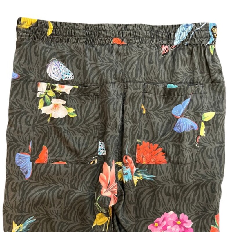 Johnny Was Blooming Elsie Jogger Pants<br />
<br />
The Blooming Elsie Jogger mixes style and comfort with its floral print and relaxed fit. The elegant stretch charmeuse fabric creates a draped look that works well with your favorite plain V-neck tee or with a simple silk tank top.<br />
Soft Silk Blend<br />
Elastic comfort waist<br />
Elastic pant leg hem<br />
Unique print featuring colorful flowers, butterflies, and hummingbirds on a gray zebra background<br />
Colors: Pink, Yellow, Blue, Green, Red, Orange, Purple, Light Gray, and Dark Gray<br />
Size: Small