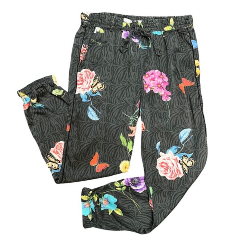 Johnny Was Blooming Elsie Jogger Pants<br />
<br />
The Blooming Elsie Jogger mixes style and comfort with its floral print and relaxed fit. The elegant stretch charmeuse fabric creates a draped look that works well with your favorite plain V-neck tee or with a simple silk tank top.<br />
Soft Silk Blend<br />
Elastic comfort waist<br />
Elastic pant leg hem<br />
Unique print featuring colorful flowers, butterflies, and hummingbirds on a gray zebra background<br />
Colors: Pink, Yellow, Blue, Green, Red, Orange, Purple, Light Gray, and Dark Gray<br />
Size: Small