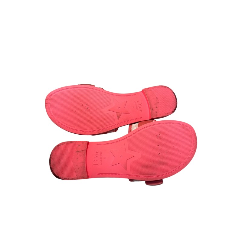 Dior Revolution Candy Pink Slides<br />
Size 38<br />
Style Code: MT0424<br />
Comes with original box and dust bag.<br />
 Some minor wear on bottoms.