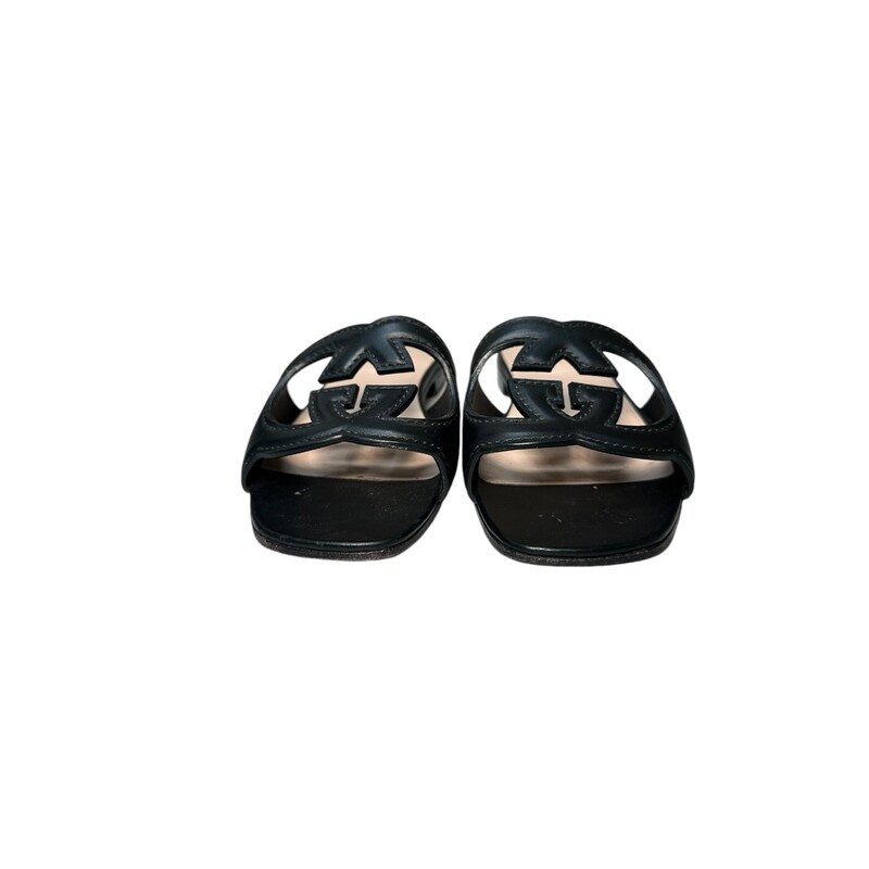 Gucci GG Interlocking Black Sandals<br />
Some waer on bottoms<br />
Size 36.5<br />
Does not come with original box or dust bag.