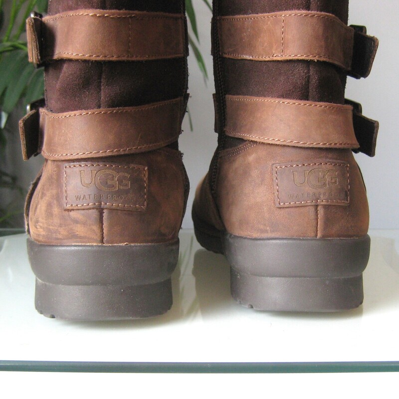 Uggs Buckle Leather, Brown, Size: 8<br />
Brown suede and leather harness boots from UGG<br />
These are their Lorna model<br />
mid calf shaft<br />
side zippers<br />
edgy straps give it the biker engineer look<br />
a bit of shearling and other warm lining materials add cushion and warmth<br />
Size 8<br />
these are used, great condition with some minor scuffs as shown.<br />
I have NOT applied leather cleaner or conditioner to these.<br />
thanks for looking!<br />
#81239