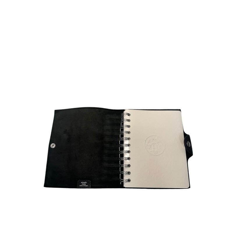 Hermes Ulysse Notebook
 Black
 Size: PM

Dimensions: L 4.5 x H 5.9

Comes with original box.
Marks on back.