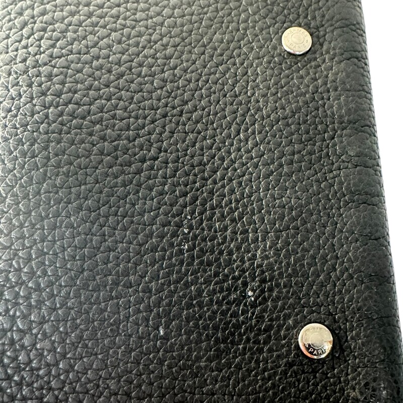 Hermes Ulysse Notebook
 Black
 Size: PM

Dimensions: L 4.5 x H 5.9

Comes with original box.
Marks on back.