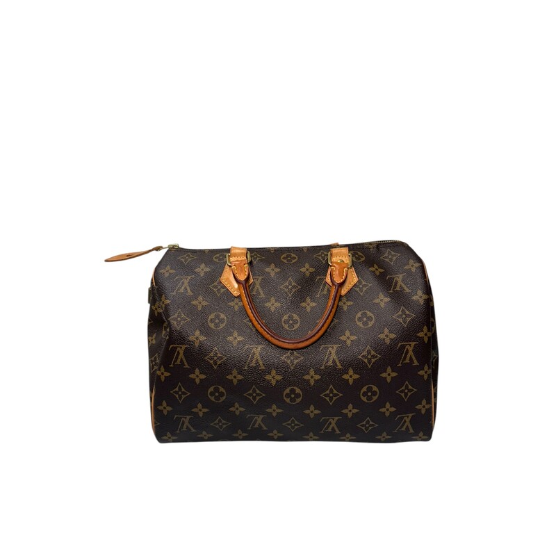 Louis Vuitton Speedy 30 Monogram<br />
<br />
Patina to the handles evenly throughout.<br />
<br />
Date Code: SD2197<br />
<br />
Dimensions: 12W x 8H x 7D<br />
<br />
Does not include original dust cover or box.