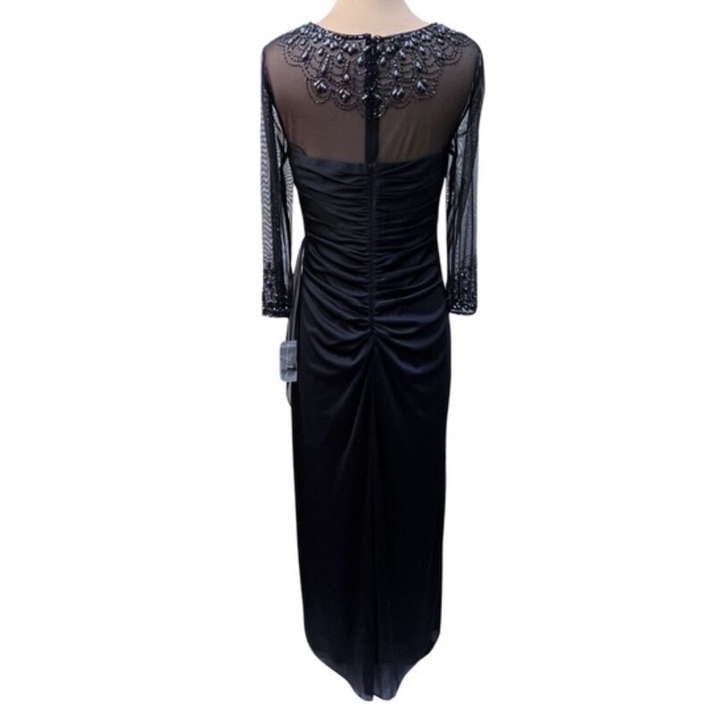 NEW Alex Evening Gown<br />
Ruched Side for A Gorgeous Silhouette<br />
Sheer Mesh Detail<br />
Bejweled n the Best Way!<br />
Color: Dark Navy<br />
Size: 8 Petite