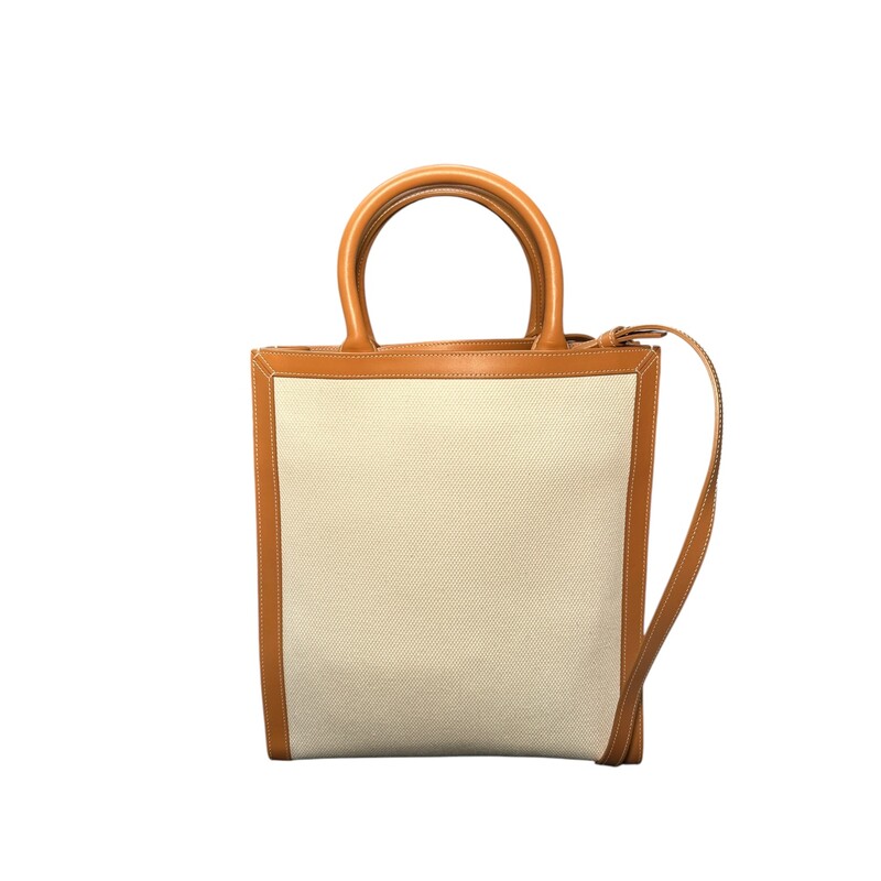 Celine Vertical Cabas Tote<br />
Canvas with Leather Trim<br />
Comes with Detachable Crossbody<br />
Strap<br />
Comes with original dust bag.<br />
Code: S-LM-5210<br />
Dimensions: 12H x11Length