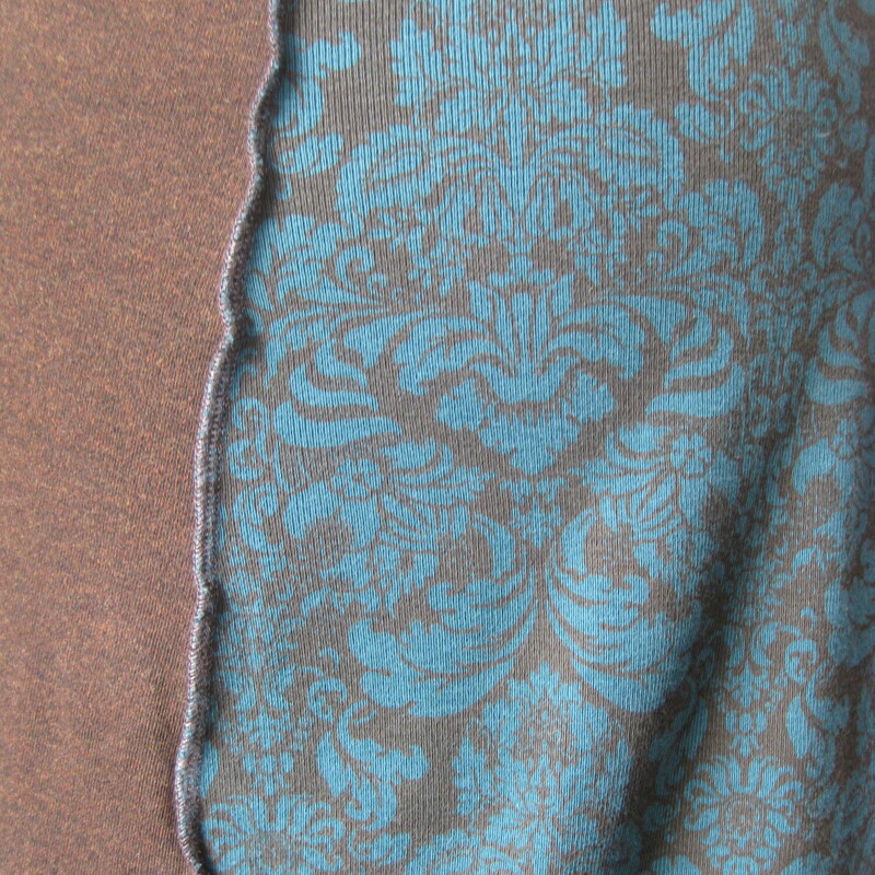 Knit Patchwork, Brown, Size: Medium<br />
Cute and comfy pencil skirt<br />
stretchy knit patchwork in brown and teal, the teal sections have a traditional acanthus leaf pattern.<br />
by Dana Murphy made in Portland Oregon<br />
no size tag, but should fit a size medium.<br />
unlined<br />
The flat measurements below were taken with the skirt lying flat and relaxed.<br />
waist: 15<br />
hip: 19 (don't be afraid, you want this stretchy skirt to hug the curves)<br />
length: 21<br />
<br />
perfect condition.<br />
Thanks for looking!<br />
#80686