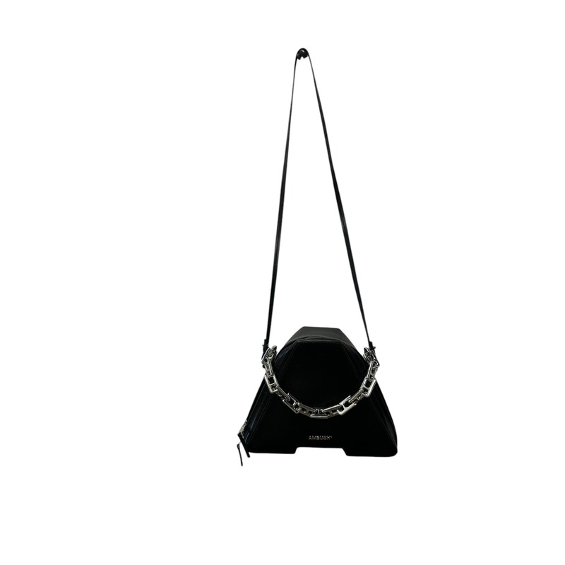 Ambush Tri Logo Plaque Tote, Black<br />
<br />
AMBUSH's signature A bag is imagined in a classic black hue here. This creates contrast with the polished silver-tone hardware for a contemporary finish.<br />
<br />
Made in Italy<br />
100% Calf Skin Outer<br />
<br />
Dimensions: Width 11 x Heighth 8.5 x Depth 3.75 Strap drop 22<br />
<br />
Scratching throughout bag.