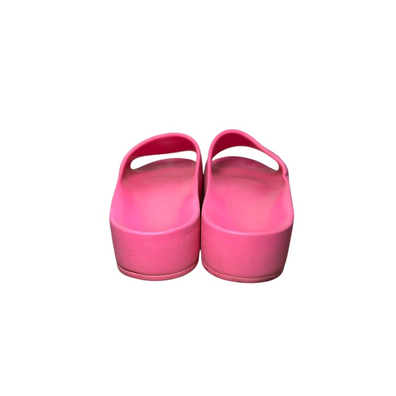 Pink Balenciaga Rubber Slides<br />
Size 37<br />
Some toe marks<br />
Some marks throughout<br />
Does not come with original box or dust bag.