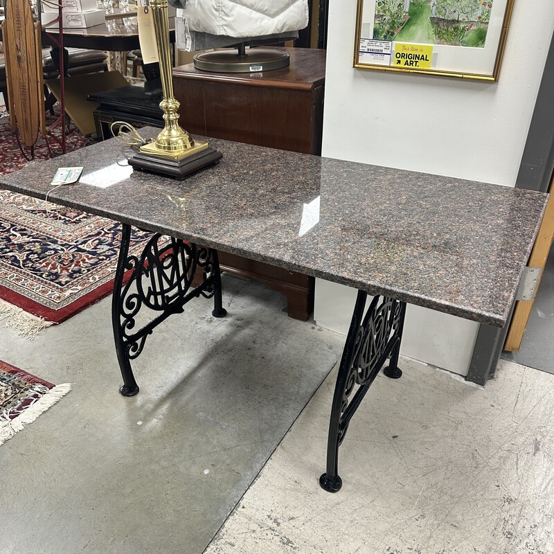 Granite Top Sewing Table, Black Iron Base. Restored and in excellent condition! HEAVY.<br />
Size: 47x24x22