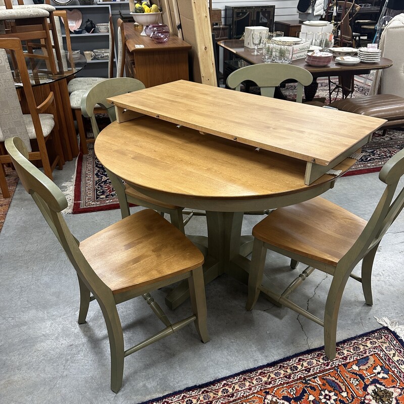 5-piece custom made Canadel Dinette Set, White Oak. Includes the round 42in table, one 25in leaf, and 4 dining chairs. Sold together as a set.