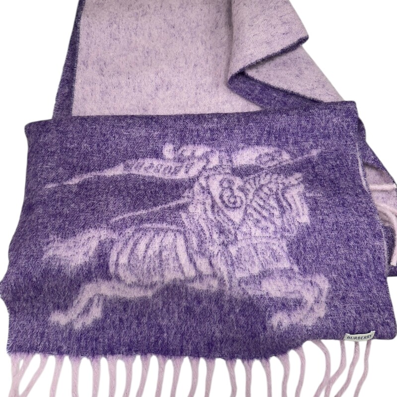 Burberry Oversized Logo Wrap<br />
Lilac<br />
New with tags<br />
21 x 84; 6 fringe<br />
Does not come with original box or dust bag.<br />
Compostion: 21% Alpaca Wool