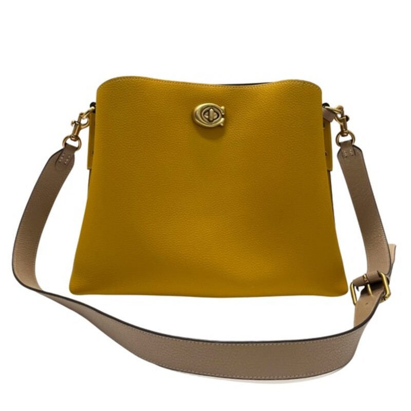 Coach Leather Willow Handbag<br />
Tan Colored Leather Strap<br />
Gold Hardware with C for Coach Closure<br />
Inside multifunction pocket, center zip compartment<br />
4 protective feet at base<br />
9 1/4 L x 8 3/4 H x 4 1/4 W<br />
Color: Mustard