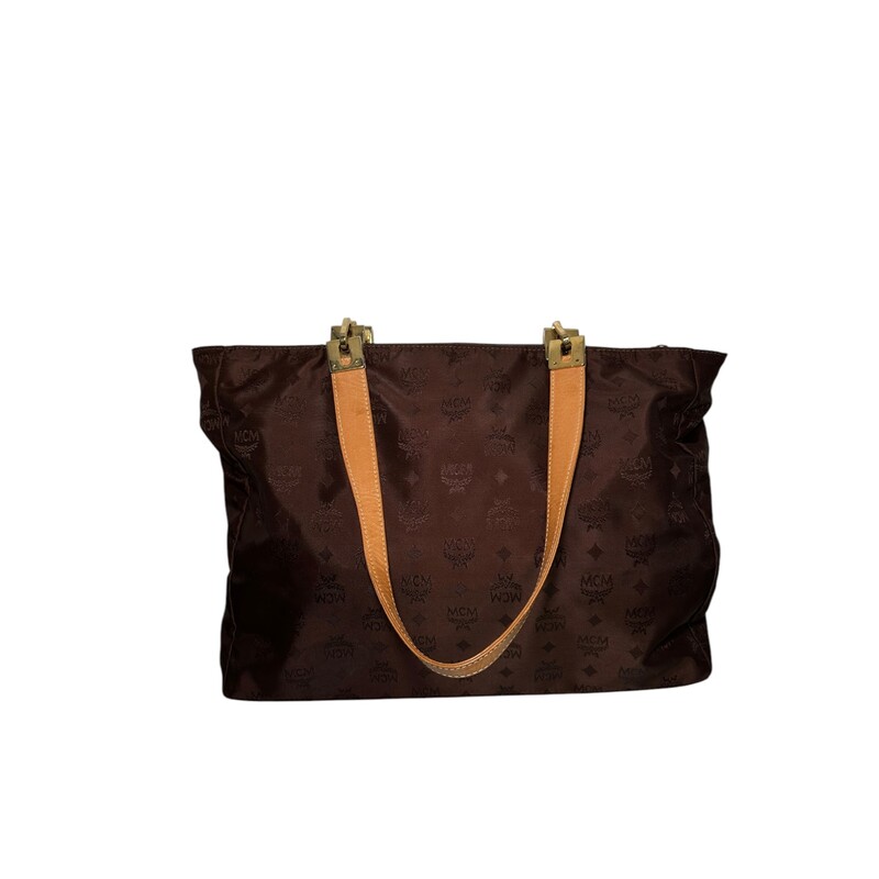 MCM  Cloth Tote<br />
Brown<br />
Size: OS<br />
Dimensions: 15X12<br />
Does not come with original box or dust bag .