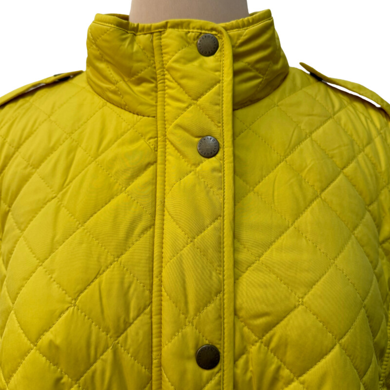 New Talbots Quilted Vest<br />
Fleece Lined<br />
Zippered Pockets<br />
Zip and Button Closure<br />
Color:  Sunshine<br />
Size: XL<br />
Retails for $119.00