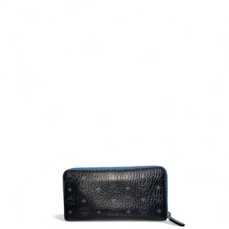 Mcm Blue Black Zip Wallet
Does not come with origianl dust bag or box.
Some puffering on leather.