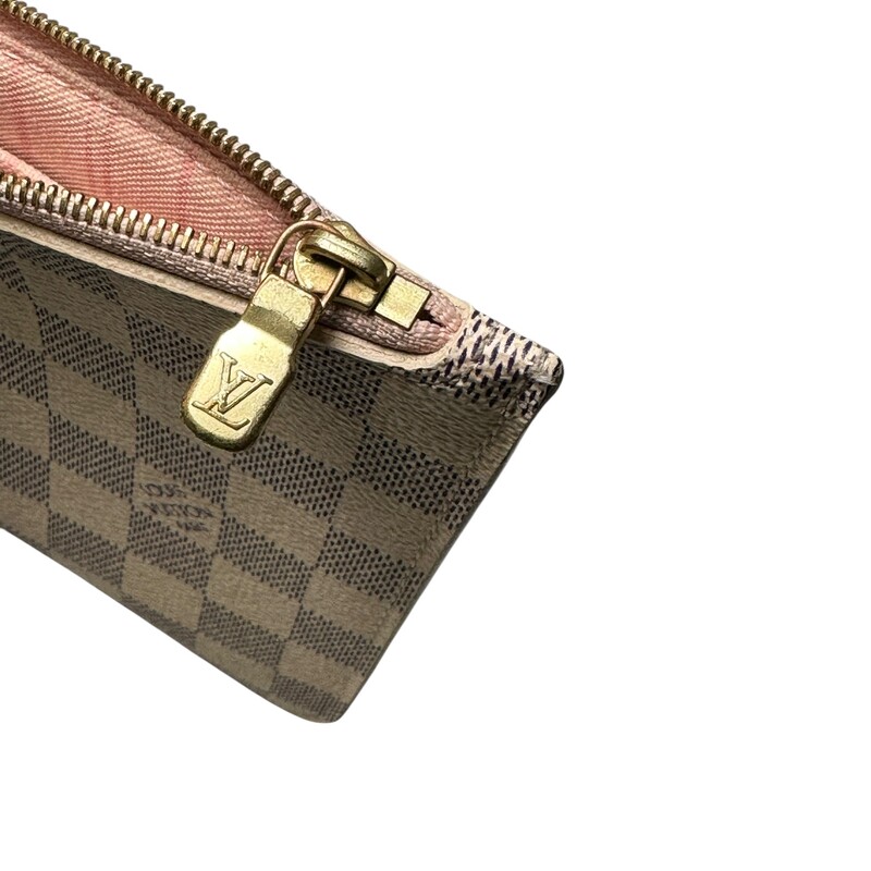 Louis Vuitton Neverfull  Pouchette GM
Some interior marks and tarnishing on hardwear.
Date Code: SD1169
Dimensions: 9.6 in length 6Heigth
Does not come with original dust bag or box.