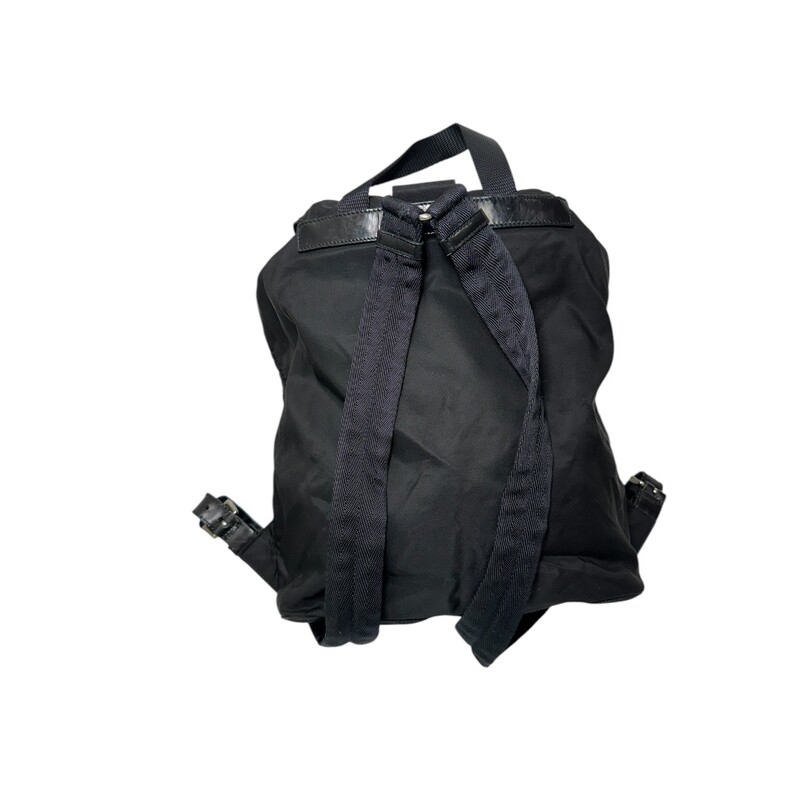 Prada Nylon Vera Black Backpack<br />
<br />
Factory Code: 58<br />
<br />
Dimensions:<br />
11.5W x 13H x 6D<br />
4 handle drop<br />
11-20 strap drop<br />
<br />
The bag is in good condition.<br />
<br />
Light wear throughout the bag.<br />
<br />
Does not come with original dust bag or box.