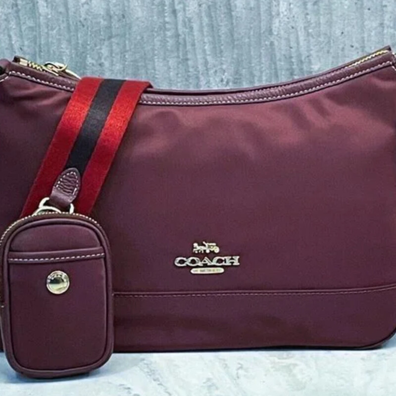 Coach Nylon Ellis Shoulder Bag
Maroon Red Brown Gold
Size: 12 x 7H