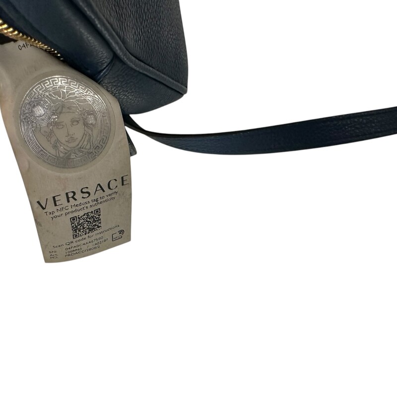 Versace Biggie Coin Blue Crossbody<br />
<br />
Dimensions:<br />
Height: 6.75<br />
Width: 4.5<br />
Depth: 1.75<br />
<br />
Comes with original dust bag. no box.<br />
<br />
In Great Shape