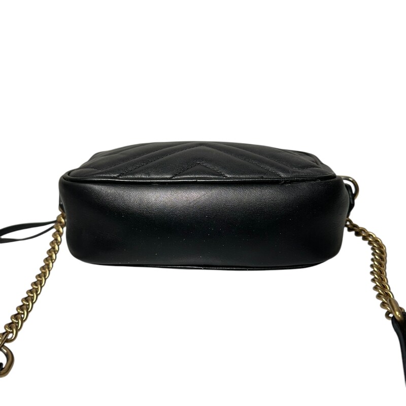 Gucci Marmont Black Mini Shoulder Bag<br />
<br />
Style Code:448065 493075<br />
<br />
Dimensions: 6.5L x 4 H<br />
<br />
Comes with original dust bag but no box<br />
<br />
Some Wear: Hardware discolored and interior stains.