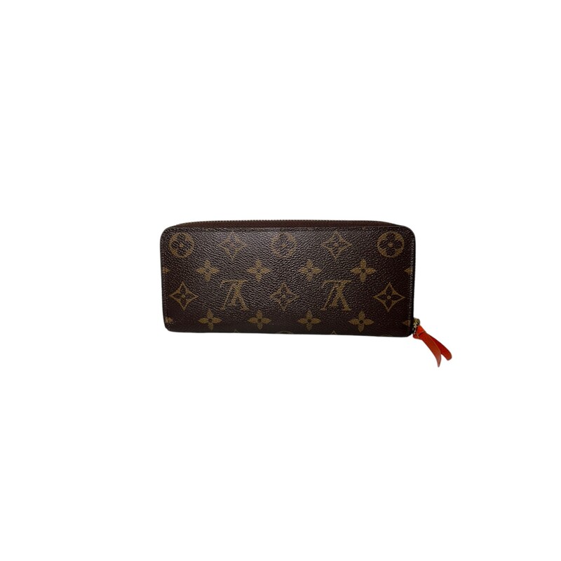 Louis Vuitton Clemence Monogram<br />
 Orange Interior<br />
<br />
Date Code: MI1125<br />
<br />
Dimensions:<br />
Length: 7.5 in<br />
Height: 3.5 in<br />
Width: 0.75 in<br />
<br />
In very good condition. Light wear to the ziper and credit card slots.<br />
<br />
Comes with original dust cover but no box.