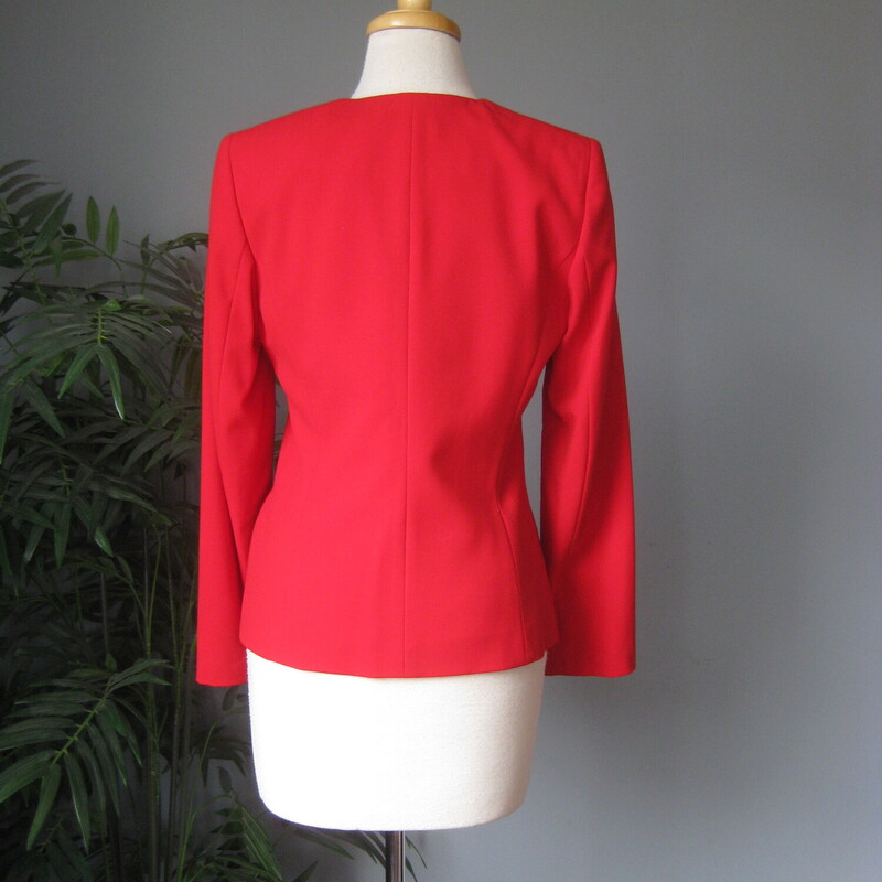 Calvin Klein, Red, Size: 4<br />
Sleek Calvin Klein Blazer with a novel touch.<br />
fitted red size 4 jacket with a gold bar closure.<br />
poly/rayon/spandex blend fabric,<br />
fully lined<br />
beautifully tailored.<br />
flat measurements:<br />
shoulder to shoulder: 14 3/8<br />
armpit to armpit: 17 1/2<br />
length: 24<br />
underarm sleeve seam: 17<br />
<br />
perfect condition, except!  the gold bar has tiny scratches.<br />
<br />
thanks for looking!<br />
#78146