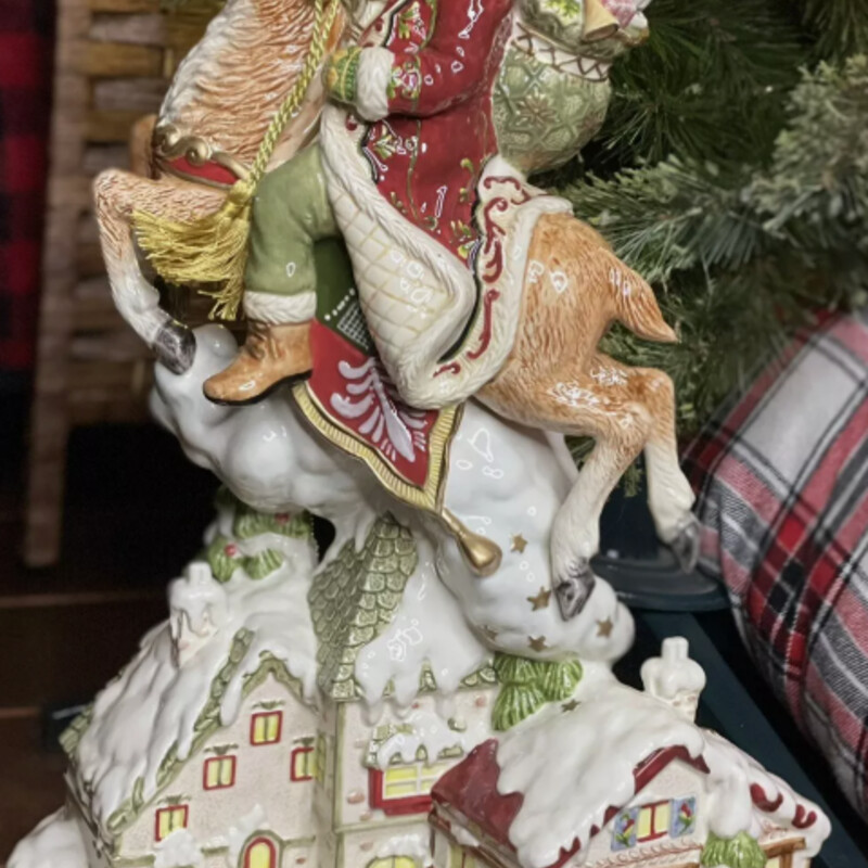 FitzFloyd Santa On Deer
Cream Tan Red Green Gold
Size: 12x6x18H
Bring some festive cheer to your home with this charming Fitz & Floyd 2008 St. Nick centerpiece. Crafted from high-quality ceramic, this traditional style piece features a jolly Santa sitting on a reindeer, with intricate detailing that will add a touch of Christmas spirit to any table.
Includes Box
Retail $250+