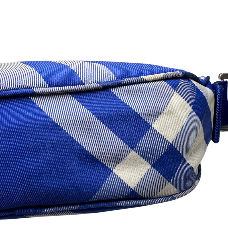 Burberry Blue Motif Fanny Pack<br />
<br />
Dimensions: 8L x6H<br />
<br />
Does not come with original dust bag or box .<br />
<br />
In Fair Condition: Stains and marks throughout the bag.<br />
<br />
Code:ITQUASRLCAL-8077771