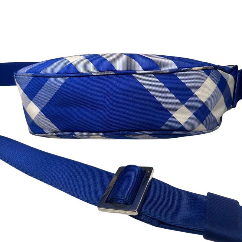 Burberry Blue Motif Fanny Pack<br />
<br />
Dimensions: 8L x6H<br />
<br />
Does not come with original dust bag or box .<br />
<br />
In Fair Condition: Stains and marks throughout the bag.<br />
<br />
Code:ITQUASRLCAL-8077771