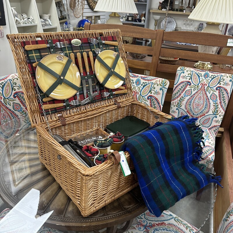 Optima Picnic Basket, Red Plaid lining. A wonderful holiday gift! Includes plates, a blanket, flatware, containers, cups and more.
Size: 16x24