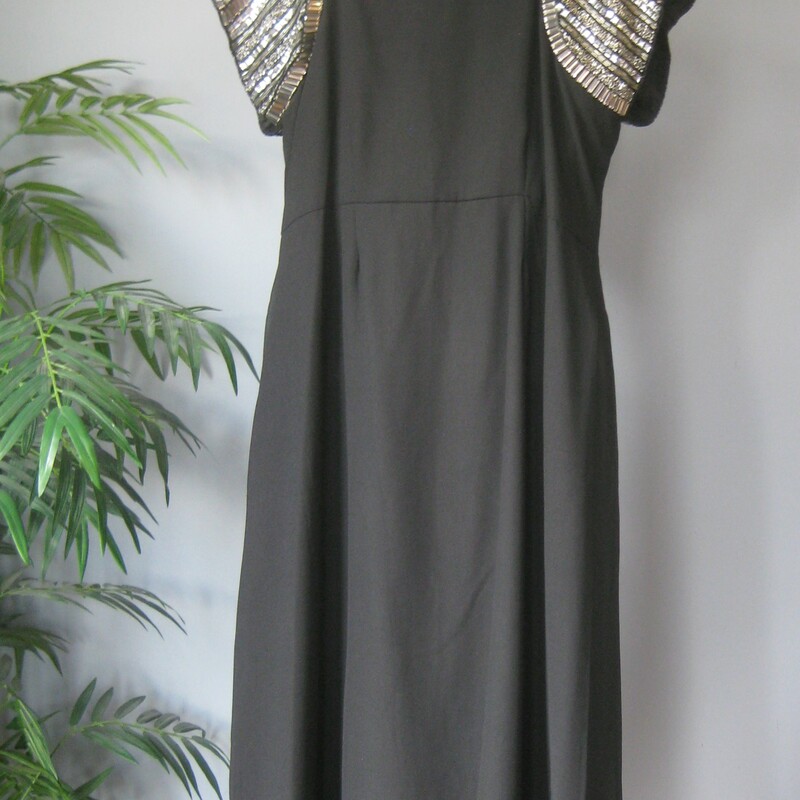 NWT Ulla Popken dress<br />
simle silhouette but with statement embellished shoulder.<br />
pretty and comfortable<br />
Comes with a little package of extra beads<br />
Sheer chiffon layer over an underlayer.<br />
high wasted, gathered skirt.<br />
marked size 16/18<br />
here are the flat meausurements:<br />
armpit to armpit: 22.25<br />
waist: 21.5, measured at the empire waist height seam between the bodice and the skirt<br />
hip: up to 28, should be free and loose from the waist down.<br />
length: 51.5<br />
<br />
brand new!<br />
thanks for looking!<br />
#78144