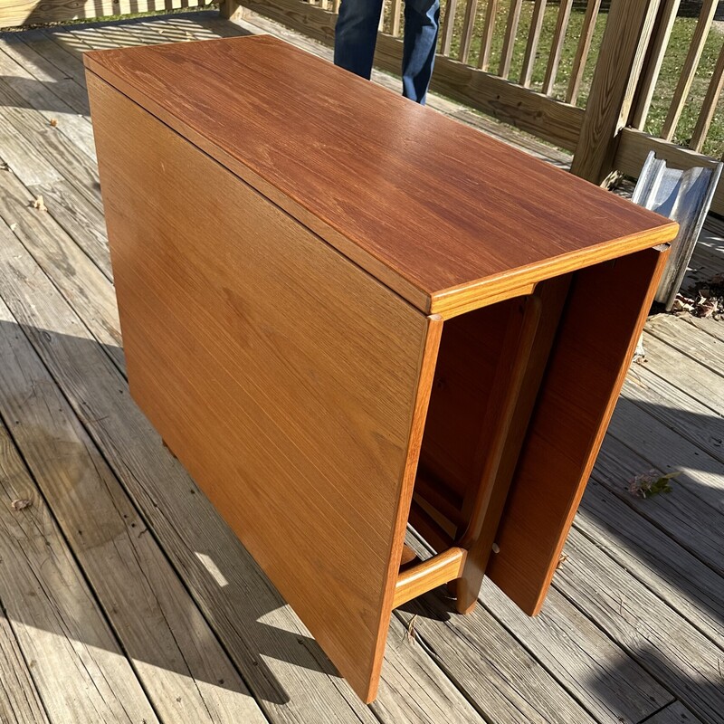 Norwegian Drop Leaf  Table
Size: 64x35x29
This wonderful dropleaf table was designed by Bendt Winge for Klepps Mobelfabrik in Norway in the 1950s/60s.  It opens to 64 inches but when closed, it only takes up 13.5 inches.  There are two gatelegs per side for stability.  It is made from Jacaranda, also know as Brazilian rosewood. It is in very good condition but there are a few areas of wear on the top.   The perfect dining table for any home.