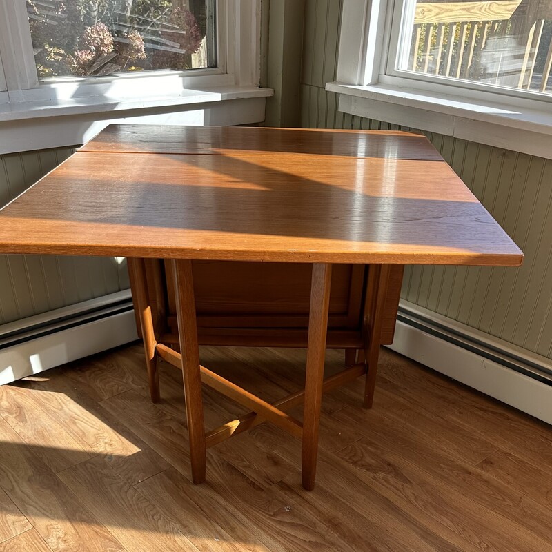 Norwegian Drop Leaf  Table
Size: 64x35x29
This wonderful dropleaf table was designed by Bendt Winge for Klepps Mobelfabrik in Norway in the 1950s/60s.  It opens to 64 inches but when closed, it only takes up 13.5 inches.  There are two gatelegs per side for stability.  It is made from Jacaranda, also know as Brazilian rosewood. It is in very good condition but there are a few areas of wear on the top.   The perfect dining table for any home.