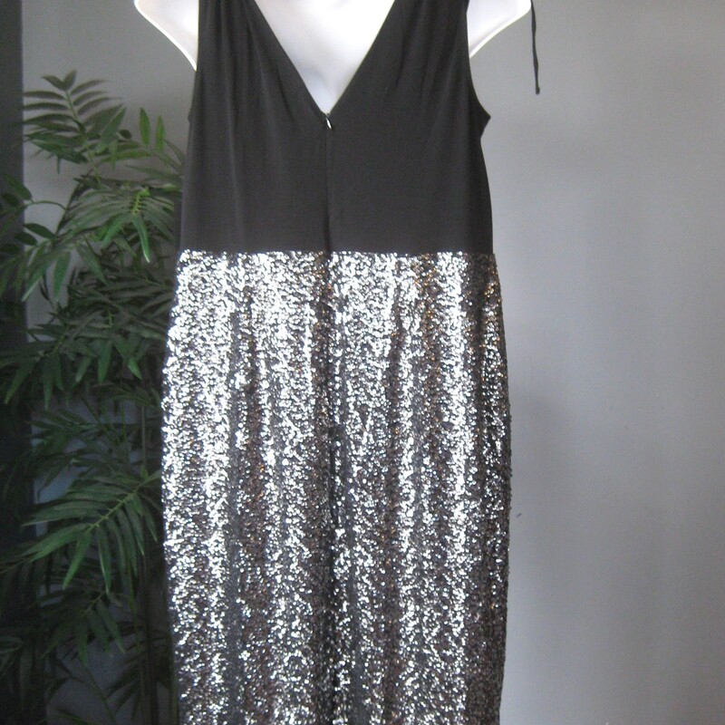 NWT Lane Branyt Sequin Ta, Black, Size: XL<br />
Attention grabbing but elegant bodycon dress by Lane Bryant<br />
New with tags.<br />
<br />
Sleeveless surplice v neck bodice and spakling sequined pencil style skirt.<br />
<br />
marked size 16<br />
Flat measurements: taken with the garment lying flat and unstretched.<br />
armpit to armpit: 20<br />
waist area: aprox 18<br />
hip area: aprox 22.5<br />
length: 45<br />
<br />
Pls note, I have this same dress marked size 18, also NWT.  Please see it here if you'd like to check those measurements and get the best fit for your body.<br />
https://www.mercari.com/us/item/m45567461843/<br />
<br />
thanks for looking!'<br />
#73173