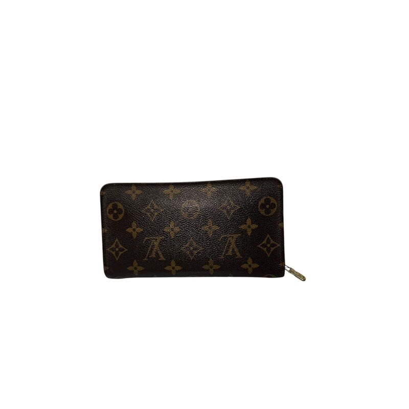 Louis Vuitton Zippy Monogram

Date Code: CA0929

Dimensions:
7.25 in Length
4 in Heigth

Does not come with the original dust bag or box.

In good condition. Wear to the exterior and the edges.