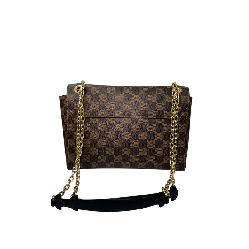 Louis Vuitton Vavin Damier Ebene Crossbody<br />
<br />
Date Code: Microchip comes with Entrupy Certificate<br />
<br />
Dimensions:<br />
10W x 7H x 3D<br />
11 handle drop<br />
13 strap drop<br />
<br />
In very good condition: minor scuff on black leather and some wear on hardware.<br />
<br />
Comes with original dust bag. No box.