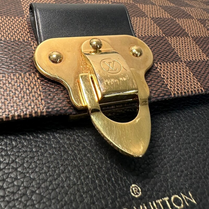 Louis Vuitton Vavin Damier Ebene Crossbody<br />
<br />
Date Code: Microchip comes with Entrupy Certificate<br />
<br />
Dimensions:<br />
10W x 7H x 3D<br />
11 handle drop<br />
13 strap drop<br />
<br />
In very good condition: minor scuff on black leather and some wear on hardware.<br />
<br />
Comes with original dust bag. No box.