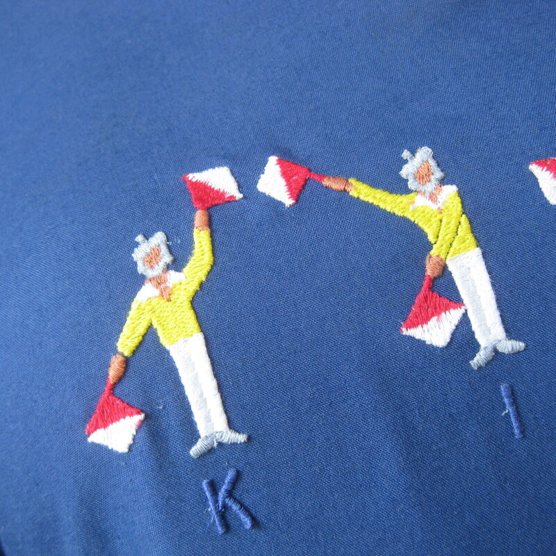 Super interesting night gown and robe set.<br />
Very lightweight blue cotton blend embroidered set made in Italy by<br />
Malizia.<br />
The robe has short sleeves each one embroidered with semaphore bearing sailors spelling out the word kiss.<br />
The nightgown has the sailors embroidered on the front and it has a keyhole like neckline outlined in yellow.<br />
Pretty and presentable, packs easily for travel when necessary.<br />
Excellent vintage condition.<br />
No size tag.<br />
the night gown measures 19.5 flat at the armpit, 20 across at the waist, 21.5 at the hip and it's 43.25 in length<br />
<br />
thanks for looking!<br />
#77674