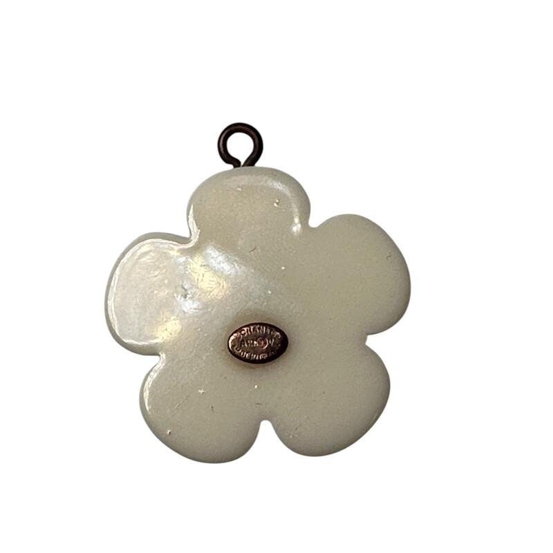 Chanel Camellia Pendant Cream<br />
<br />
Style Code: A19 V<br />
<br />
Dimensions:<br />
1in<br />
<br />
In Very Good Condition. Missing the chain, only the pendant.<br />
<br />
Does not come with the original dust bag or box.