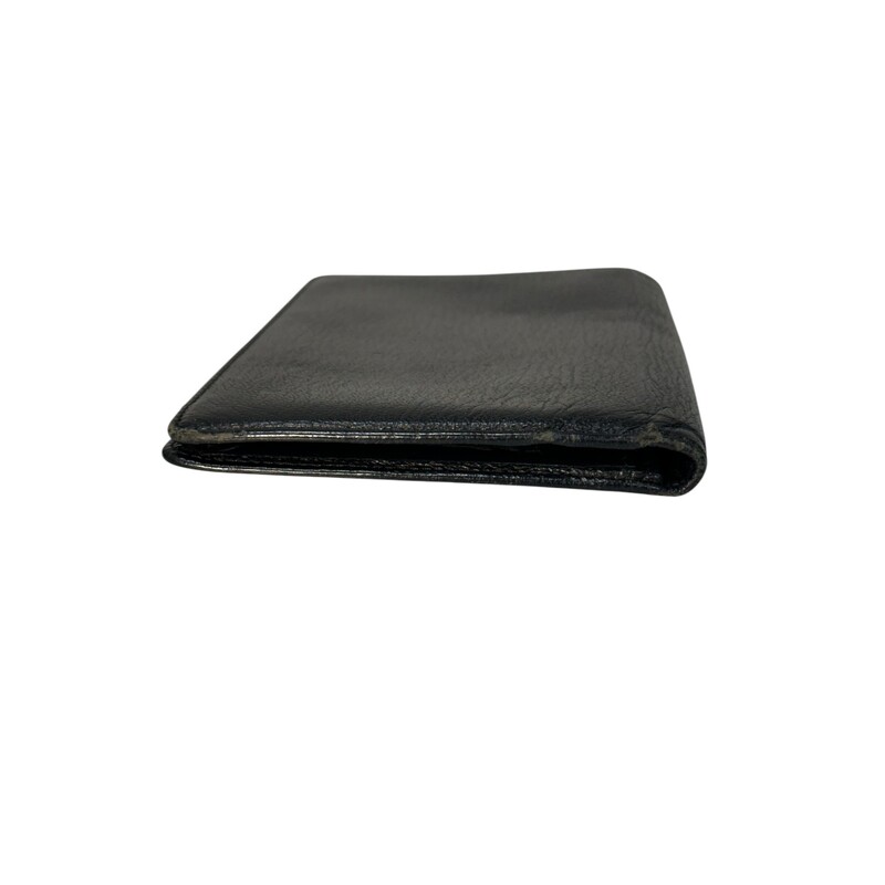 Chanel Bifold Pocket Small Wallet Black<br />
<br />
Date Code:6771568<br />
<br />
Dimensions:<br />
6 L x 4.25W x .25 D<br />
<br />
Very Good condition. Light wear around the exterior and on the interior. Normal wear to the interior pockets.<br />
<br />
<br />
Does not come with the original dust bag or box.