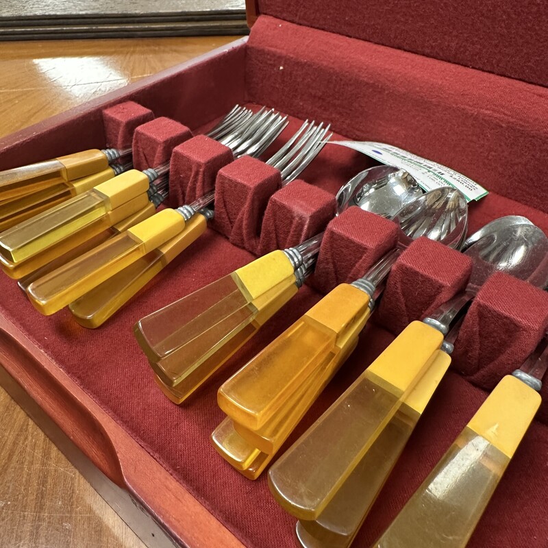 48-piece Two-Tone Bakelite Flatware, with 8 place settings total. Includes the storage chest. Beautiful vintage set.