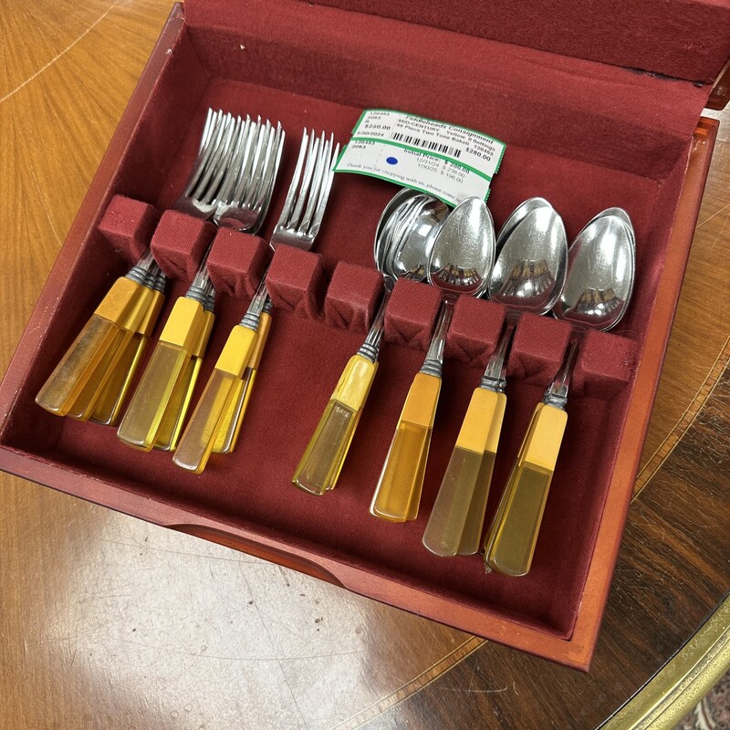 48-piece Two-Tone Bakelite Flatware, with 8 place settings total. Includes the storage chest. Beautiful vintage set.