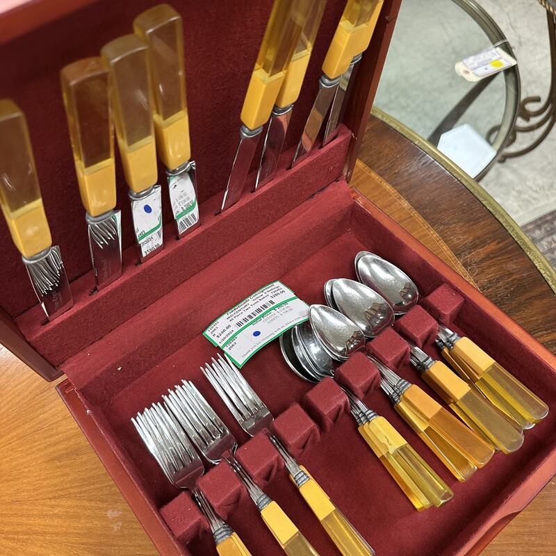 48-piece Two-Tone Bakelite Flatware, with 8 place settings total. Includes the storage chest. Beautiful vintage set.